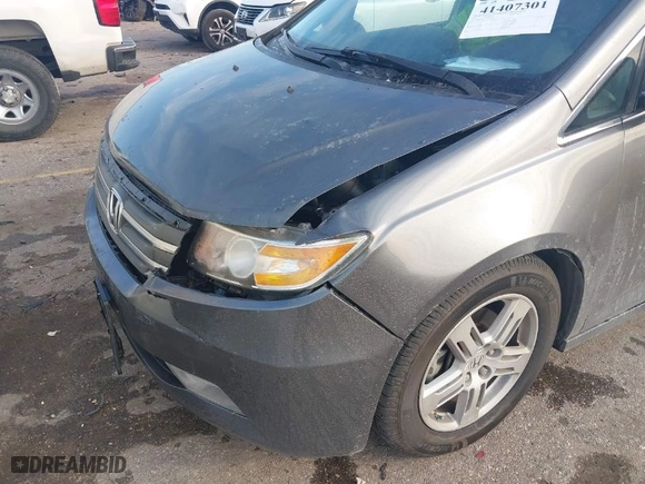 2012 Honda Odyssey Touring with VIN 5FNRL5H99CB033289, listed as a IAAI auction lot 41407301 with NaN miles. Bid and sale history available at carsss.com. Image 6.