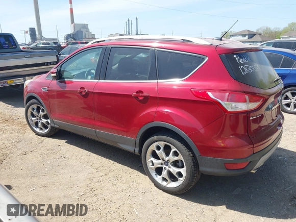 2014 Ford Escape Titanium with VIN 1FMCU0JX8EUC19300, listed as a IAAI auction lot 42138925 with 111,709 mi miles. Bid and sale history available at carsss.com. Image 3.