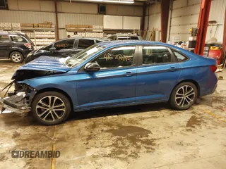 2023 Volkswagen Jetta Sport with VIN 3VWBM7BU4PM010718, listed as a IAAI auction lot 41582445 with 45,382 mi miles and . Bid and sale history available at DreamBid. Image 14.