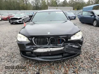 2013 BMW 7 Series 750Li z VIN WBAYE8C53DD131817, wystawiony jako Copart lot #79615564 z przebiegiem 125 737 mil mil oraz Szkoda całkowita • Salvage title. Historia ofert i sprzedaży dostępna na DreamBid. Obrazek 5.