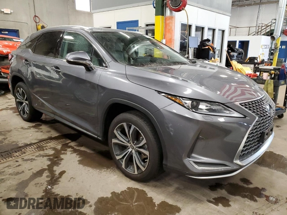 2022 Lexus RX with VIN 2T2HZMDA2NC323851, listed as a Copart auction lot 70025382 with 26,613 mi miles. Bid and sale history available at carsss.com. Image 4.