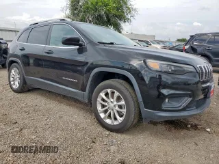 2019 Jeep Cherokee Latitude with VIN 1C4PJLCB6KD264183, listed as a Copart auction lot 64871745 with 121,556 mi miles and Salvage title. Bid and sale history available at DreamBid. Image 4.