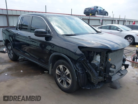 2017 Honda Ridgeline RTL z VIN 5FPYK2F55HB011463, wystawiony jako IAAI lot #42139030 z przebiegiem 59 066 mil mil oraz . Historia ofert i sprzedaży dostępna na DreamBid. Obrazek 1.