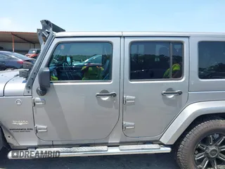 2013 Jeep Wrangler Unlimited Sahara with VIN 1C4BJWEG4DL666930, listed as a IAAI auction lot 42310569 with 206,577 mi miles and . Bid and sale history available at DreamBid. Image 14.