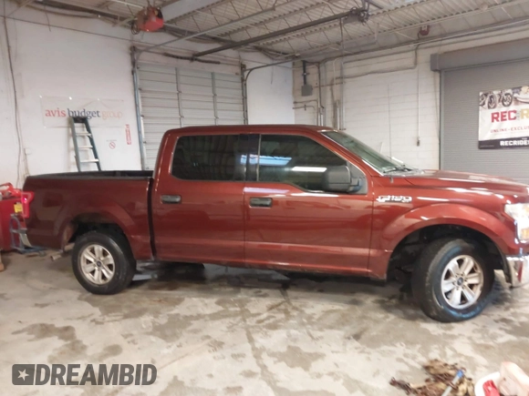 2015 Ford F-150 XLT with VIN 1FTEW1C84FKD05672, listed as a IAAI auction lot 41366154 with 119,504 mi miles and . Bid and sale history available at carsss.com. Image 13.