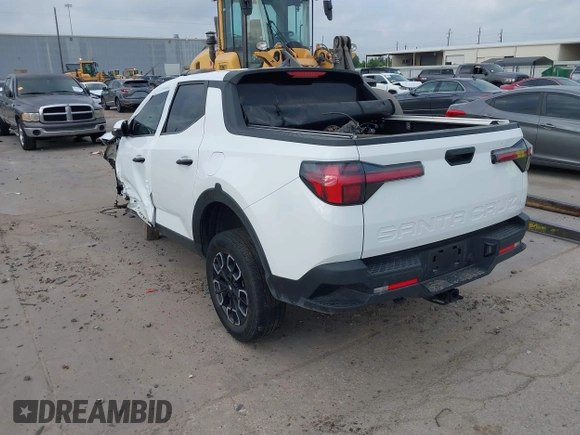 2022 Hyundai Santa Cruz SEL z VIN 5NTJBDAE5NH007005, wystawiony jako IAAI lot #42058065 z przebiegiem 30 825 mil mil oraz . Historia ofert i sprzedaży dostępna na DreamBid. Obrazek 3.