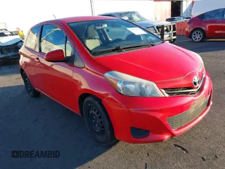 2012 Toyota Yaris L with VIN JTDJTUD31CD537755, listed as a IAAI auction lot 41527394 with 102,783 mi miles. Bid and sale history available at carsss.com. Image 1.