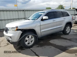 2011 Jeep Grand Cherokee Laredo z VIN 1J4RR4GG1BC576277, wystawiony jako Copart lot #63220925 z przebiegiem 149 573 mil mil oraz Szkoda całkowita • Salvage title. Historia ofert i sprzedaży dostępna na DreamBid. Obrazek 1.