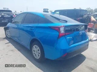 2021 Toyota Prius L Eco with VIN JTDKAMFUXM3134462, listed as a IAAI auction lot 42450931 with 89,239 mi miles and . Bid and sale history available at DreamBid. Image 3.