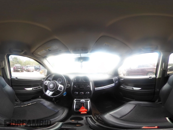 2016 Jeep Compass Latitude z VIN 1C4NJDEB6GD596061, wystawiony jako IAAI lot #42623673 z przebiegiem 180 777 mil mil oraz . Historia ofert i sprzedaży dostępna na DreamBid. Obrazek 18.