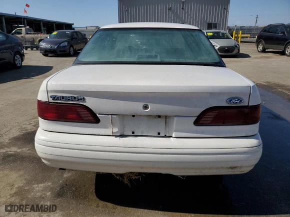 1994 Ford Taurus GL with VIN 1FALP52U7RG261559, listed as a Copart auction lot 55681304 with 28,675 mi miles and Salvage Title. Bid and sale history available at carsss.com. Image 6.