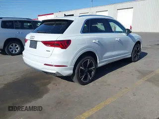 2019 Audi Q3 Premium z VIN WA1AECF32K1072625, wystawiony jako IAAI lot #42326866 z przebiegiem 67 351 mil mil oraz . Historia ofert i sprzedaży dostępna na DreamBid. Obrazek 4.