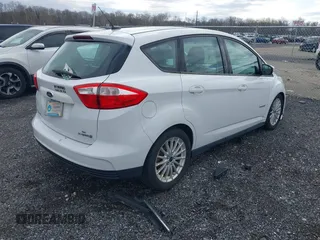 2014 Ford C-Max SE with VIN 1FADP5AU7EL504732, listed as a IAAI auction lot 41739282 with 60,801 mi miles. Bid and sale history available at carsss.com. Image 4.