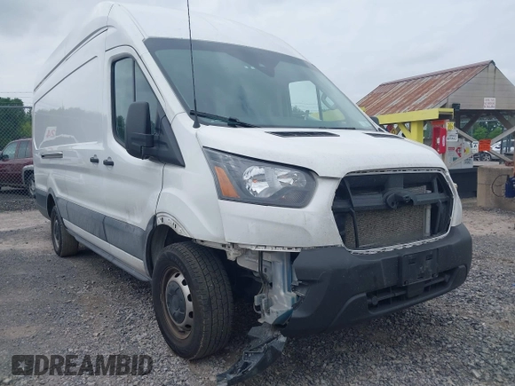 2024 Ford Transit Cargo z VIN 1FTBR3X89RKA14329, wystawiony jako IAAI lot #42483348 z przebiegiem 85 692 mil mil oraz . Historia ofert i sprzedaży dostępna na DreamBid. Obrazek 6.