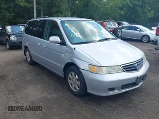 2004 Honda Odyssey EX-L with VIN 5FNRL18094B007447, listed as a IAAI auction lot 42725731 with 247,849 mi miles and . Bid and sale history available at DreamBid. Image 1.