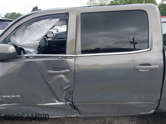 2017 GMC Sierra 1500 SLE z VIN 3GTP1MEC0HG230277, wystawiony jako IAAI lot #41997297 z przebiegiem Nie podano mil oraz . Historia ofert i sprzedaży dostępna na DreamBid. Obrazek 14.