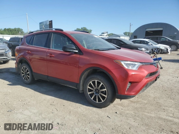 2017 Toyota RAV4 LE with VIN 2T3BFREV9HW543578, listed as a Copart auction lot 57887255 with 97,688 mi miles and Salvage title. Bid and sale history available at DreamBid. Image 4.