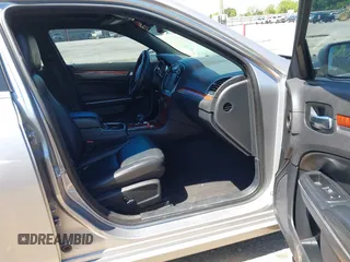 2014 Chrysler 300 with VIN 2C3CCAAG8EH264595, listed as a IAAI auction lot 42076996 with 101,659 mi miles and . Bid and sale history available at DreamBid. Image 5.