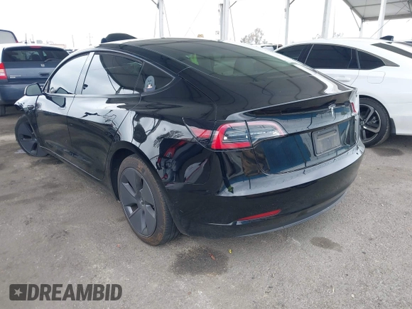 2023 Tesla Model 3 with VIN 5YJ3E1EA7PF473749, listed as a IAAI auction lot 41921478 with 21,483 mi miles and . Bid and sale history available at DreamBid. Image 3.