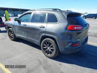 2014 Jeep Cherokee Latitude with VIN 1C4PJMCS3EW298340, listed as a IAAI auction lot 41708488 with 217,438 mi miles and . Bid and sale history available at DreamBid. Image 3.