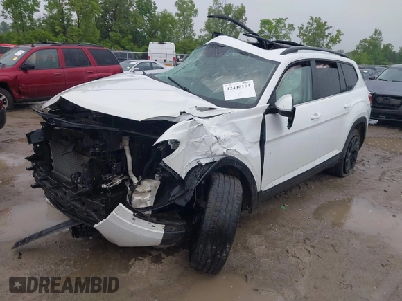 2022 Volkswagen Atlas SE with VIN 1V2KR2CA0NC509427, listed as a IAAI auction lot 42440164 with 52,898 mi miles and . Bid and sale history available at DreamBid. Image 2.