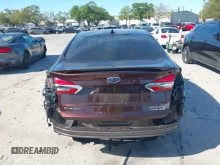 2019 Ford Fusion Hybrid Titanium with VIN 3FA6P0RU2KR123786, listed as a IAAI auction lot 41857026 with 49,604 mi miles. Bid and sale history available at carsss.com. Image 17.