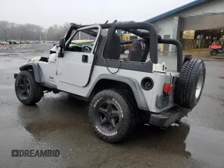2004 Jeep Wrangler Sport with VIN 1J4FA49S64P767393, listed as a Copart auction lot 51662605 with 165,942 mi miles and Salvage Title. Bid and sale history available at carsss.com. Image 2.