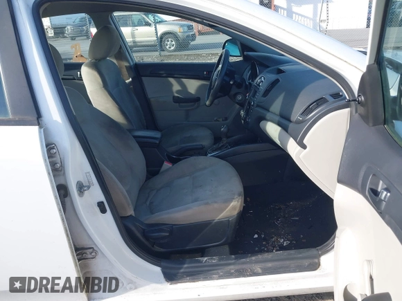 2011 Kia Forte LX with VIN KNAFT4A27B5434458, listed as a IAAI auction lot 41269635 with 238,721 mi miles. Bid and sale history available at carsss.com. Image 5.