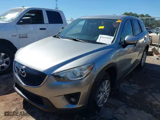 2015 Mazda CX-5 Touring with VIN JM3KE2CY0F0435575, listed as a IAAI auction lot 41652819 with 130,339 mi miles. Bid and sale history available at carsss.com. Image 17.