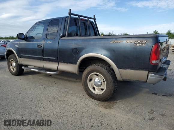 2001 Ford F-150 XL with VIN 1FTRX18L01NA29591, listed as a Copart auction lot 50591035 with 250,345 mi miles and Salvage Title. Bid and sale history available at carsss.com. Image 2.
