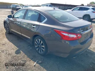 2016 Nissan Altima SR with VIN 1N4AL3AP8GC210448, listed as a IAAI auction lot 42152335 with 158,351 mi miles and . Bid and sale history available at carsss.com. Image 3.
