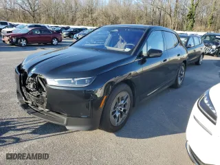 2022 BMW iX xDrive50 with VIN WB523CF09NCK46216, listed as a Copart auction lot 46918714 with 26,342 mi miles. Bid and sale history available at carsss.com. Image 1.