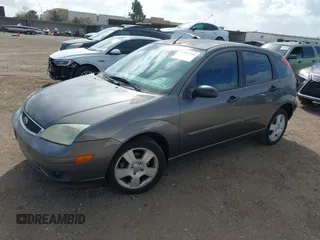2007 Ford Focus S with VIN 1FAFP37N17W174231, listed as a IAAI auction lot 41901594 with 91,677 mi miles and . Bid and sale history available at carsss.com. Image 2.