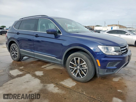 2021 Volkswagen Tiguan SE with VIN 3VV2B7AX6MM051899, listed as a Copart auction lot 62870765 with 56,848 mi miles and Clean title. Bid and sale history available at DreamBid. Image 4.