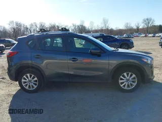 2013 Mazda CX-5 Sport z VIN JM3KE4BE3D0141748, wystawiony jako IAAI lot #41836498 z przebiegiem 163 118 mil mil oraz . Historia ofert i sprzedaży dostępna na DreamBid. Obrazek 13.