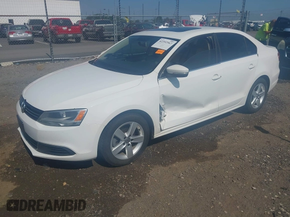 2014 Volkswagen Jetta TDI w/Premium/Nav with VIN 3VWLL7AJXEM366828, listed as a IAAI auction lot 42392563 with 132,924 mi miles and . Bid and sale history available at DreamBid. Image 18.