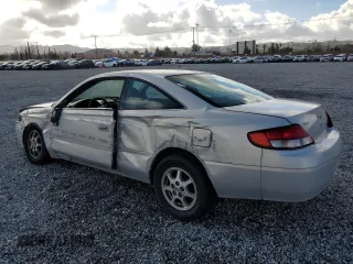 2000 Toyota Solara SE with VIN 2T1CG22P0YC277702, listed as a Copart auction lot 47311565 with 371,789 mi miles and Salvage Title. Bid and sale history available at carsss.com. Image 2.