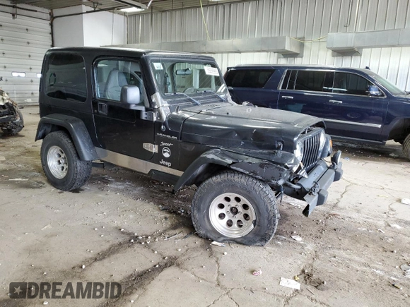 2002 Jeep Wrangler Sport with VIN 1J4FA49S62P713475, listed as a Copart auction lot 59299965 with 114,654 mi miles and Non repairable. Bid and sale history available at DreamBid. Image 4.