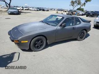 1987 Porsche 944 with VIN WP0AB0944HN472642, listed as a Copart auction lot 55420985 with 122,200 mi miles and Salvage title. Bid and sale history available at DreamBid. Image 1.