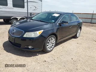 2013 Buick LaCrosse Premium 1 z VIN 1G4GF5E34DF264852, wystawiony jako IAAI lot #42272513 z przebiegiem 125 382 mil mil oraz . Historia ofert i sprzedaży dostępna na DreamBid. Obrazek 2.