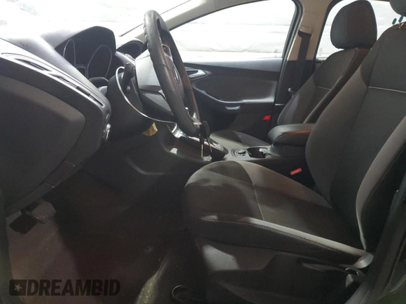 2013 Ford Focus SE with VIN 1FADP3K27DL229864, listed as a Copart auction lot 49821675 with 208,385 mi miles and Salvage Title. Bid and sale history available at DreamBid. Image 7.