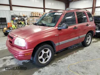 1999 Suzuki Vitara JLS z VIN 2S3TE52V6X6110719, wystawiony jako Copart lot #44219825 z przebiegiem 190 311 mil mil oraz Szkoda całkowita • Salvage title. Historia ofert i sprzedaży dostępna na DreamBid. Obrazek 1.