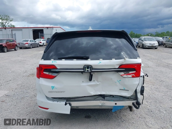 2023 Honda Odyssey Touring with VIN 5FNRL6H88PB079716, listed as a IAAI auction lot 42208628 with 26,679 mi miles and . Bid and sale history available at DreamBid. Image 17.