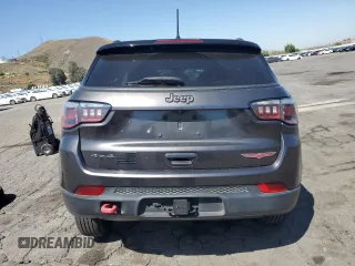 2018 Jeep Compass Trailhawk z VIN 3C4NJDDB0JT130449, wystawiony jako Copart lot #57486015 z przebiegiem 87 318 mil mil oraz Szkoda całkowita • Salvage title. Historia ofert i sprzedaży dostępna na DreamBid. Obrazek 6.