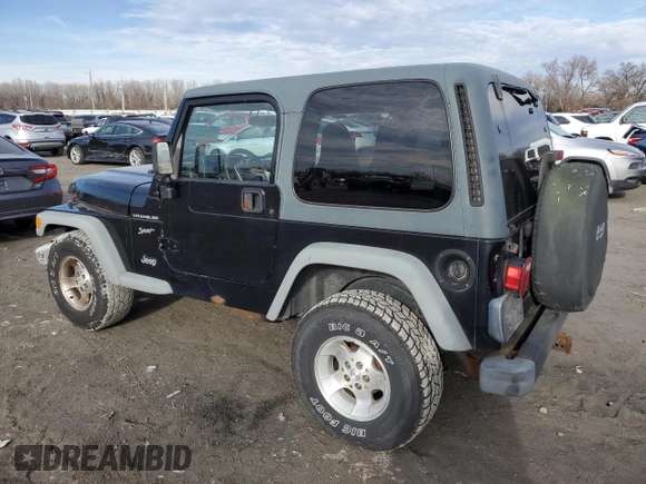 2002 Jeep Wrangler Sport with VIN 1J4FA49S32P758082, listed as a Copart auction lot 80692073 with 148,784 mi miles and Salvage Title. Bid and sale history available at carsss.com. Image 2.