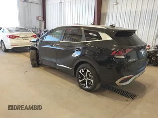 2023 Kia Sportage EX with VIN KNDPVCAG8P7095454, listed as a IAAI auction lot 42335661 with 96,718 mi miles and . Bid and sale history available at DreamBid. Image 3.
