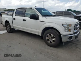 2017 Ford F-150 XL with VIN 1FTEW1CFXHFC04386, listed as a Copart auction lot 52819555 with 167,813 mi miles and Salvage title. Bid and sale history available at DreamBid. Image 4.