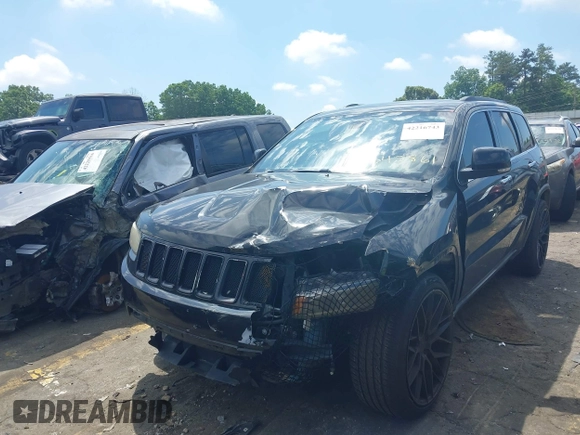 2014 Jeep Grand Cherokee Limited with VIN 1C4RJFBG3EC545861, listed as a IAAI auction lot 42216743 with 160,000 mi miles and . Bid and sale history available at DreamBid. Image 17.