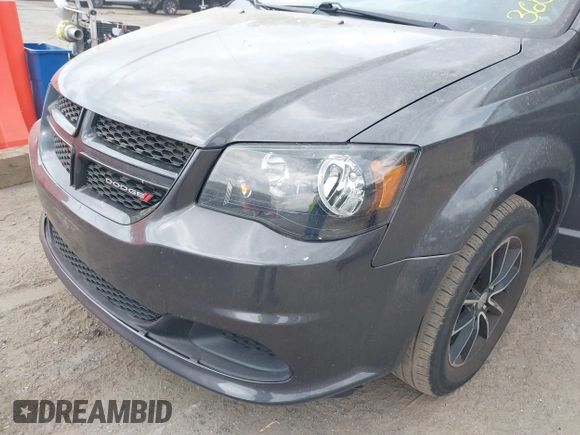 2015 Dodge Grand Caravan American Value with VIN 2C4RDGBG2FR542844, listed as a IAAI auction lot 42109983 with 129,718 mi miles and . Bid and sale history available at DreamBid. Image 6.
