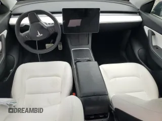 2022 Tesla Model Y Performance with VIN 7SAYGDEF7NF507184, listed as a Copart auction lot 58329875 with 98,320 mi miles and Salvage title. Bid and sale history available at DreamBid. Image 8.
